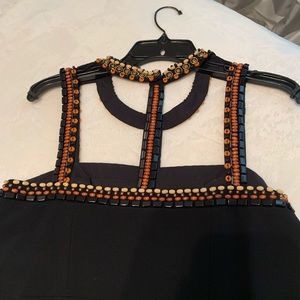 Beautiful black dress with stones brand new.
